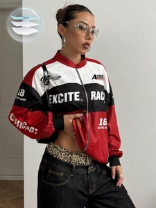 Détail d'une veste de course fine avec blocs de couleurs rouge et noir et imprimés