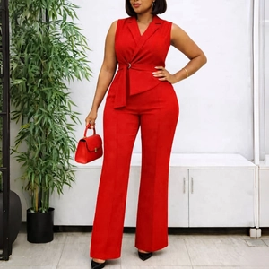 Chic red sleeveless V-neck jumpsuit featuring a waist tie and elegant metal ring buckle