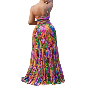 Detail of multi-colored feather print and back zipper on this summer tiered maxi dress