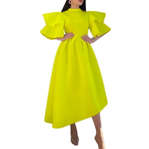 Detail of neon yellow party dress with dramatic double-layer ruffle sleeves and A-line waist