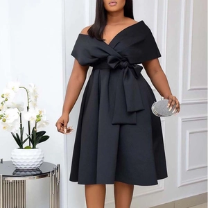Elegant black off-shoulder cocktail dress with large waist bow and A-line silhouette