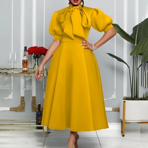 Elegant bright yellow midi dress with bow tie neck and puff sleeves for evening parties