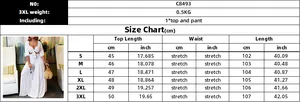 Detailed size guide table for women's two-piece crop top and wide-leg trousers set
