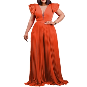 Women's pleated V-neck wide leg jumpsuit in bright orange with sheer mesh and belt