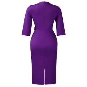 Detail view of the back zipper and slit on this purple pleated African midi dress