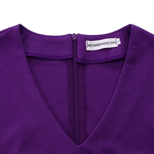 Detail of the purple V-neck dress featuring a neat invisible zipper and high-quality fabric