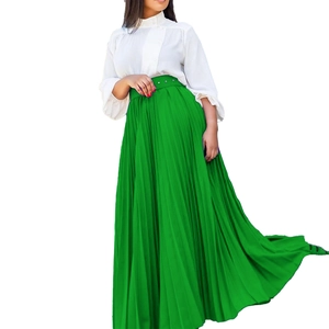Detail view of high-waist pleated bright green maxi skirt with matching belt fabric