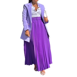 Detail view of purple pleated maxi skirt with matching buttoned waist belt