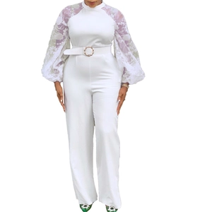 Elegant white wide-leg jumpsuit with lace puff sleeves and a matching belt detail