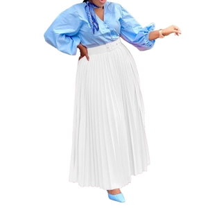 Detail of white high-waisted pleated maxi skirt with matching belt for elegant outfits