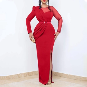 Detail of red slim fit evening dress featuring sheer mesh sleeves and ruched neckline