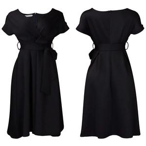 Detail view of black V-neck dress featuring wrap design, waist tie, and back zipper