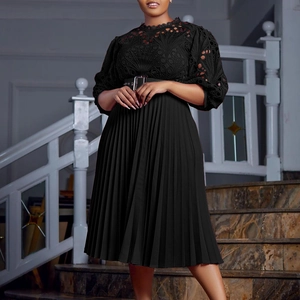Elegant black pleated dress with lace embroidery, standing collar and lantern sleeves