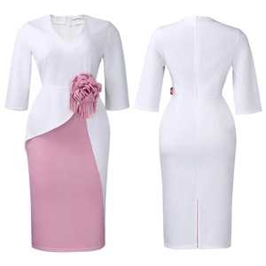 Detail of elegant V-neck dress featuring a large 3D pink flower and fringe on waist