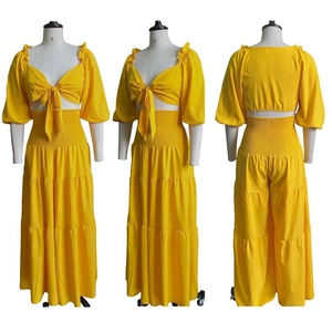 Three-view detail of yellow two-piece set with V-neck tie-front top and tiered maxi skirt