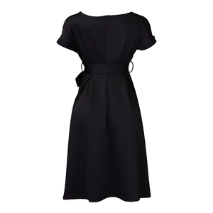 Detail view of the back of a black V-neck A-line dress with belt and hidden zipper