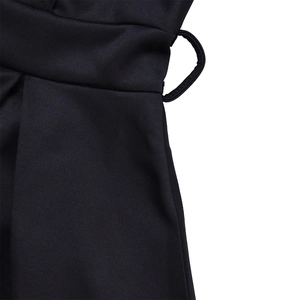 Detail shot of the wide waistband and reinforced belt loops on black plus size gown