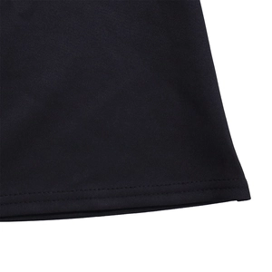 Macro view of double-stitched hem and fine fabric texture of the black V-neck dress