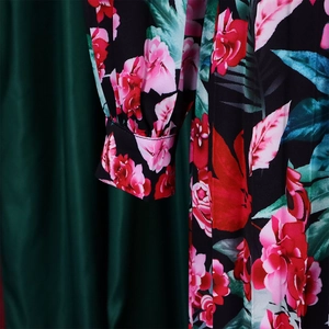 Detail of floral print long sleeve dress showing elastic cuff and stitching quality