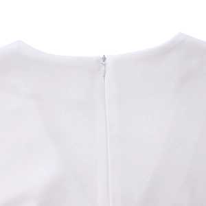 Detail of invisible zipper and woven texture on white African dress neckline back