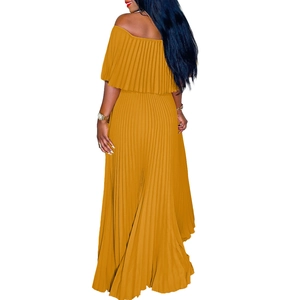 Rear view of pleated off-the-shoulder long mustard yellow dress showing fine fabric texture