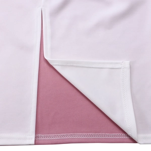 Close-up of the side slit detail showing high-quality stitching on white and pink fabric