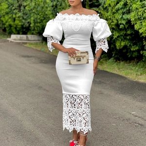 Detail of off-shoulder lace neckline and puff sleeves on white plus size party dress