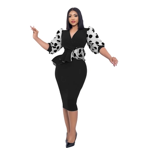 Elegant black pencil dress with white polka dot mesh puff sleeves and 3D floral accent