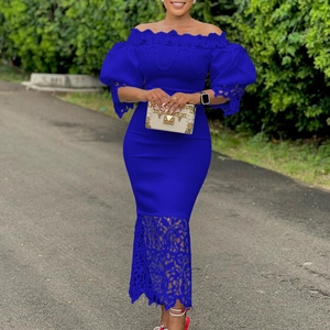 Detailed lace embroidery and puff sleeves on this royal blue off-shoulder dress