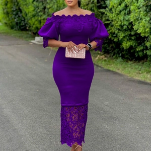 Detailed lace floral embroidery on the hem of a dark purple off-shoulder dress