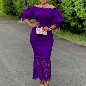 Detail of off-shoulder purple dress featuring exquisite lace trim and puff sleeves