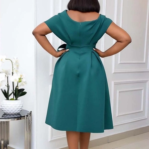 Elegant deep forest green V-neck dress with cinched waist and backless A-line design