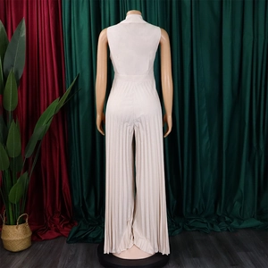 Detail view of the back of a beige sleeveless jumpsuit with elegant pleated wide-leg trousers