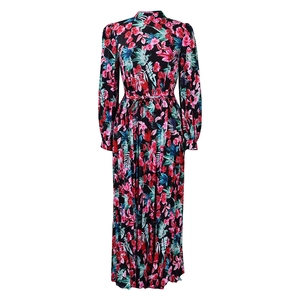 Detail view of long-sleeve floral pleated dress with high neck and waist belt