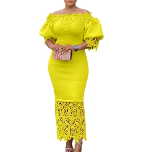 Detailed close-up of bright yellow off-shoulder dress with intricate floral lace trim