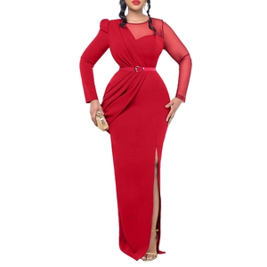 Detail of red mesh patchwork dress featuring ruched waist and elegant high side slit design
