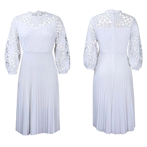 Detailed front and back view of white lace hollow-out dress with pleated skirt