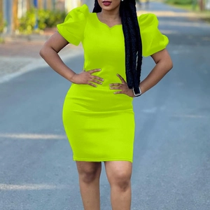 Neon green bodycon mini dress with puff sleeves and crew neck for a slim fit look