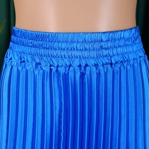 Detail of the high-waisted elastic band and fine pleats on this royal blue maxi skirt