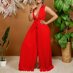 Elegant red V-neck sleeveless jumpsuit with pleated wide-leg design and waist tie detail