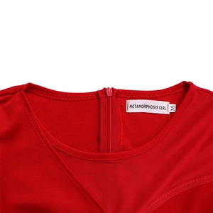 Close-up of red crew neck with pleated mesh detail and hidden back zipper on dress