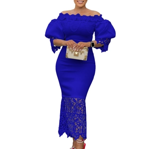 Detail of royal blue off-shoulder lace trim and puff sleeves on a formal evening dress