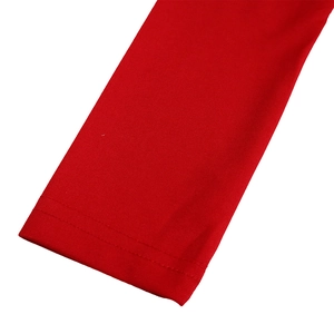 Detailed close-up of double-stitched red elastic cuffs with precise mesh stitching