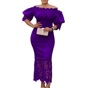 Detail of purple off-shoulder dress with lace trim and elegant puff sleeves