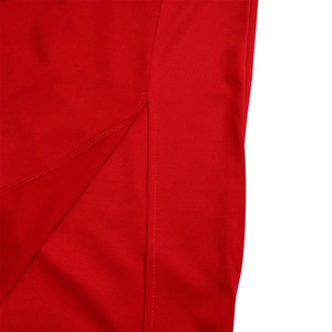 Detailed close-up showing the refined slit stitching and smooth hem of the red mesh dress