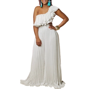 Detail of white off-shoulder ruffled top and pleated wide-leg trousers matching set