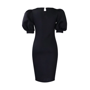 Detail of the back keyhole closure and puff sleeves on this black bodycon midi dress