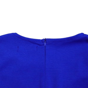 Detail view of royal blue dress with hidden back zipper and mesh stitching craft