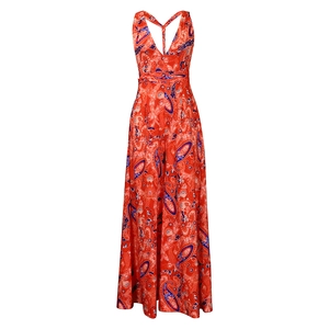 Detail view of red paisley print maxi dress with deep V-neck and crisscross back design