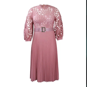 Detail of pink lace bodice and pleated skirt with a buckled belt for women